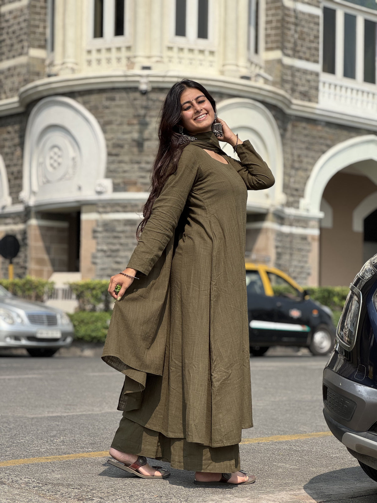 Woman wearing an olive green kurta in Mumbai, styled for everyday wear