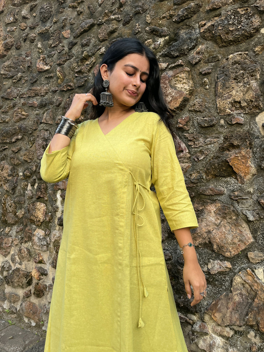 Real image of afeemi model wearing lime kurta set for women