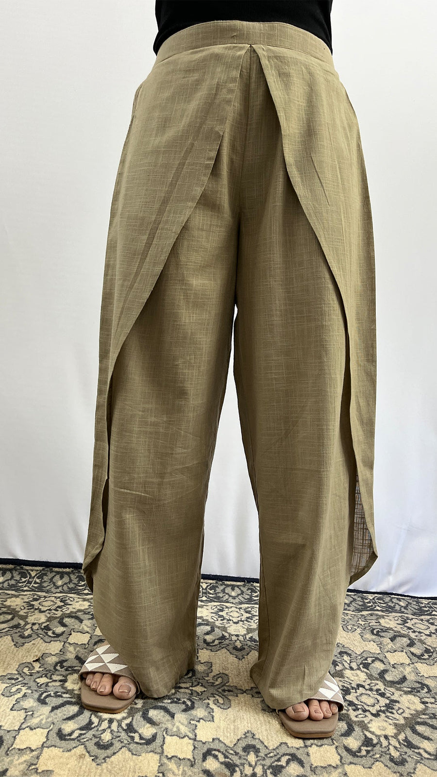 Olive green wide-leg dhoti pants with layered drape detail
