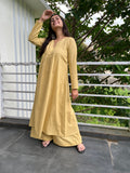 Woman wearing Afeemi's daffodil gher kurta with palazzo