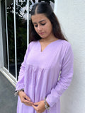 Afeemi lilac purple kurta close-up showing V-neckline, front pleats and soft cotton fabric