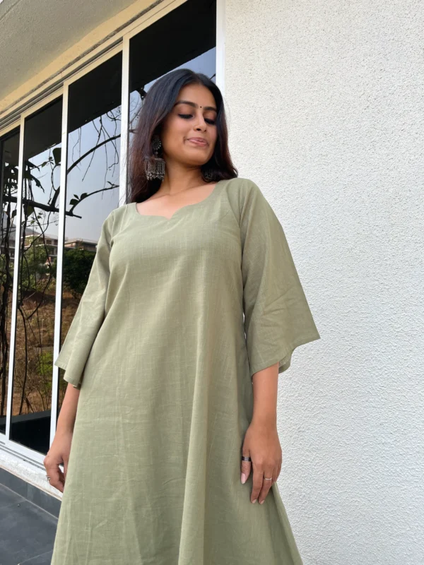 Aarohi suit set in earthy green