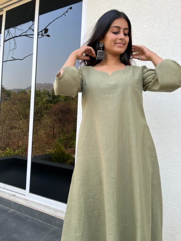 Aarohi suit set in earthy green